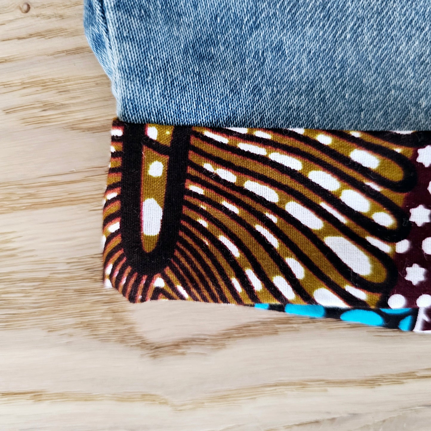 Unisex Denim Shorts with African Print Detail.