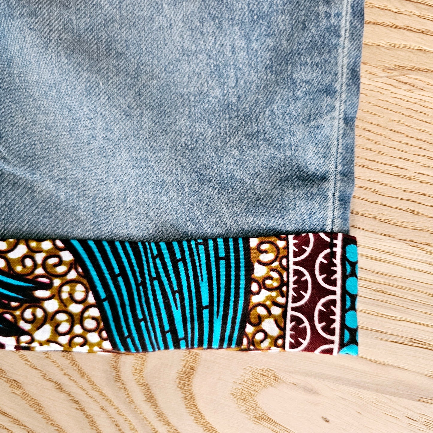 Unisex Denim Shorts with African Print Detail.